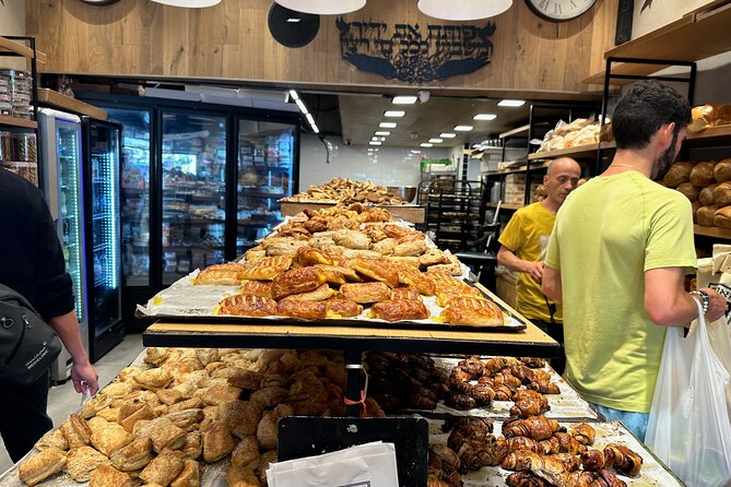 Tel Aviv: Carmel Market Food Tasting Tour “Shuk Hacarmel” - A small group, photos, and the guide’s role