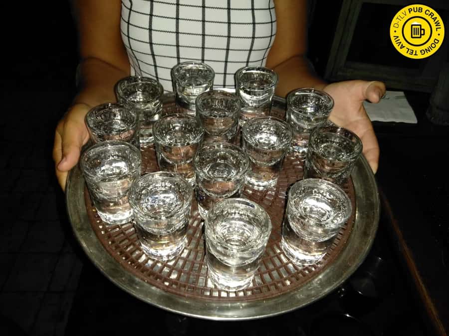 Tel Aviv: Pub Crawl and Nightlife Tour with Shots - The third stop, where the night picks up speed